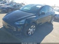 2023 Tesla Model Y — photo 2 of 20 | VIN 7SAYGDEE3PA028171