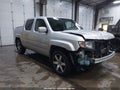 2014 Honda Ridgeline — photo 1 of 17 | VIN 5FPYK1F68EB007888