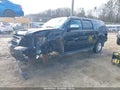 2013 Chevrolet Suburban 1500 — photo 2 of 12 | VIN 1GNSKJE73DR361391