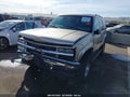 1999 Chevrolet Tahoe — photo 6 of 16 | VIN 1GNEK13RXXJ475506