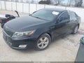 2015 Kia Optima — photo 2 of 11 | VIN 5XXGM4A79FG484800