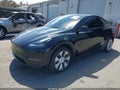 2023 Tesla Model Y — photo 2 of 20 | VIN 7SAYGDEE5PA199763