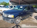 2002 Ford F-150 — photo 2 of 11 | VIN 1FTRW07L02KC55650