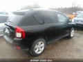 2014 Jeep Compass — photo 4 of 11 | VIN 1C4NJCBA0ED585334