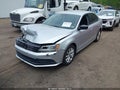 2015 Volkswagen Jetta — photo 2 of 11 | VIN 3VWD17AJ3FM265318