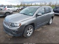 2014 Jeep Compass — photo 2 of 12 | VIN 1C4NJCEA3ED604275