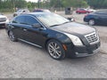 2014 Cadillac XTS — photo 1 of 16 | VIN 2G61U5S31E9151104