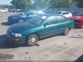 1996 Geo Prizm — photo 2 of 10 | VIN 1Y1SK5261TZ025745