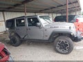2013 Jeep Wrangler Unlimited — photo 13 of 16 | VIN 1C4BJWFG0DL683433