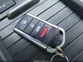 2014 Acura TL — photo 11 of 16 | VIN 19UUA8F55EA004063