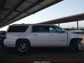 2015 Chevrolet Suburban 1500 — photo 13 of 16 | VIN 1GNSKKKC1FR259159