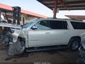 2015 Chevrolet Suburban 1500 — photo 14 of 16 | VIN 1GNSKKKC1FR259159