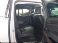 2015 Chevrolet Suburban 1500 — photo 8 of 16 | VIN 1GNSKKKC1FR259159