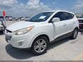 2013 Hyundai Tucson — photo 2 of 11 | VIN KM8JU3AC2DU689195
