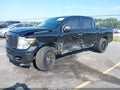 2017 Nissan Titan — photo 2 of 15 | VIN 1N6AA1EJ4HN535921