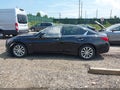 2015 Infiniti Q50 — photo 14 of 16 | VIN JN1BV7AR7FM407589