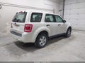 2011 Ford Escape — photo 4 of 11 | VIN 1FMCU0C79BKC30276