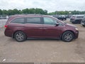 2014 Honda Odyssey — photo 13 of 16 | VIN 5FNRL5H65EB054990