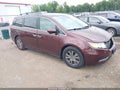 2014 Honda Odyssey — photo 1 of 16 | VIN 5FNRL5H65EB054990