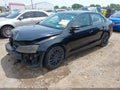 2014 Volkswagen Jetta — photo 2 of 16 | VIN 3VWD17AJ9EM435812