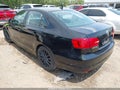 2014 Volkswagen Jetta — photo 3 of 16 | VIN 3VWD17AJ9EM435812