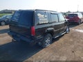 2000 GMC Yukon — photo 4 of 16 | VIN 1GKEK63R0YR199804