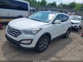 2016 Hyundai Santa Fe — photo 2 of 16 | VIN 5XYZUDLB9GG316405