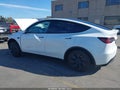 2024 Tesla Model Y — photo 3 of 17 | VIN 7SAYGDED6RF107721