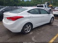 2013 Hyundai Elantra — photo 4 of 11 | VIN 5NPDH4AE3DH219992