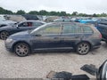 2015 Volkswagen Golf SportWagen — photo 14 of 16 | VIN 3VWCA7AU7FM504908