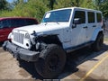 2012 Jeep Wrangler Unlimited — photo 2 of 17 | VIN 1C4HJWEG5CL159754