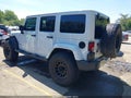 2012 Jeep Wrangler Unlimited — photo 3 of 17 | VIN 1C4HJWEG5CL159754