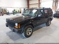2001 Jeep Cherokee — photo 2 of 15 | VIN 1J4FF48S11L504556
