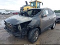 2013 Hyundai Tucson — photo 2 of 11 | VIN KM8JU3AC8DU670019