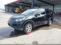2014 Honda CR-V — photo 2 of 17 | VIN 2HKRM4H38EH651162