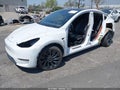 2022 Tesla Model Y — photo 2 of 13 | VIN 7SAYGDEE3NF368677