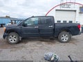 2006 Nissan Titan — photo 14 of 16 | VIN 1N6BA07B26N525616