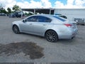 2014 Acura TL — photo 14 of 16 | VIN 19UUA8F30EA003398