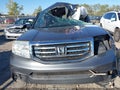 2013 Honda Pilot — photo 13 of 17 | VIN 5FNYF4H2XDB002442