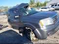 2013 Honda Pilot — photo 14 of 17 | VIN 5FNYF4H2XDB002442
