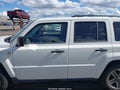 2009 Jeep Patriot — photo 14 of 16 | VIN 1J4FF28B99D250217