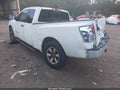2011 Nissan Titan — photo 3 of 11 | VIN 1N6BA0CH2BN305168