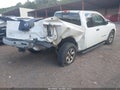2011 Nissan Titan — photo 4 of 11 | VIN 1N6BA0CH2BN305168