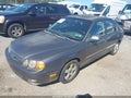 2004 Kia Spectra — photo 2 of 12 | VIN KNAFB161645137508