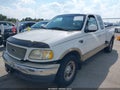 2000 Ford F-150 — photo 2 of 11 | VIN 1FTRX07L6YKA12916