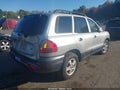 2003 Hyundai Santa Fe — photo 4 of 11 | VIN KM8SC73E73U549817
