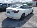 2022 Tesla Model 3 — photo 4 of 16 | VIN 5YJ3E1EA9NF168086