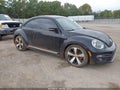 2014 Volkswagen Beetle — photo 1 of 16 | VIN 3VW4S7AT3EM612708
