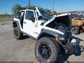 2020 Jeep Wrangler Unlimited — photo 16 of 18 | VIN 1C4HJXDG8LW192639
