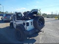 2020 Jeep Wrangler Unlimited — photo 3 of 18 | VIN 1C4HJXDG8LW192639
